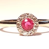 Anello Oro 18kt con 10 diamanti bianchi e Rubino