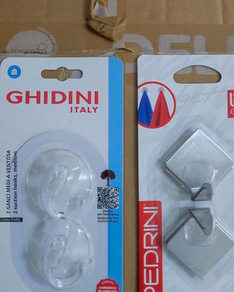 Ganci adesivi e a ventosa attaccapanni