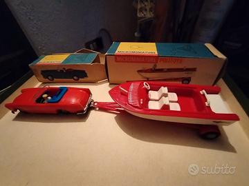 Auto + barca a traino