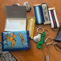 13 portachiavi vari un ports biglietti ds visita