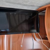televisore camper 12v e  220 con staffa