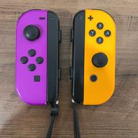 joycon viola e arancione + joycon grip nintendo