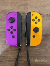 joycon viola e arancione + joycon grip nintendo