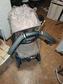 Passeggino,box e fasciatoio per bambini