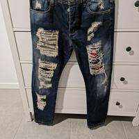 Pantalone con strappi taglia 50