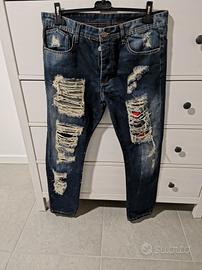 Pantalone con strappi taglia 50