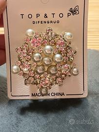 spilla a forma di fiocco 