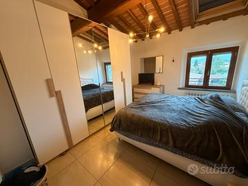 letto contenitore con testata