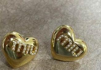 Orecchini d'amore dorati Miu Miu