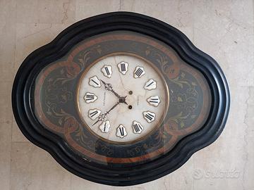Antico orologio ( occhio di bue) da parete