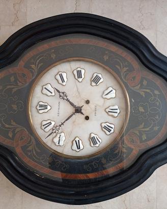 Antico orologio ( occhio di bue) da parete