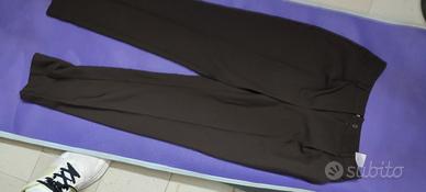 stock pantaloni donna 