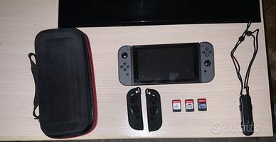 Nintendo switch con accessori e giochi