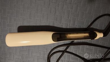 PIASTRA A VAPORE PER CAPELLI