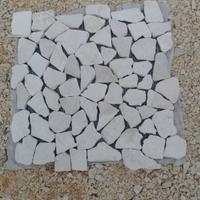 Mosaico in marmo su rete