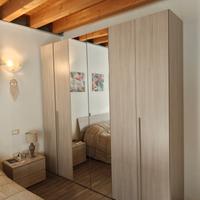 Armadio 6 ante battenti con specchio centrale