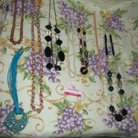 7collane(E 4 cad)+1completo(E 4):collan e braccial