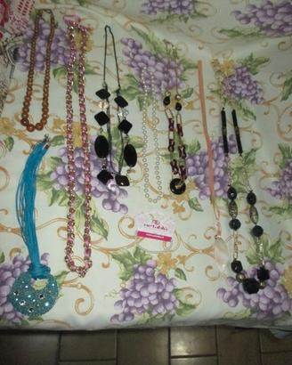 7collan(E3,50cad)+1complet(E3,5):collan e braccial