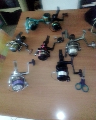 Lotto 7 mulinelli da pesca