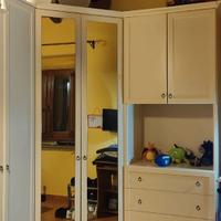 Armadio ad angolo più 1 comodino