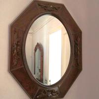 Specchio ottagonale in legno intarsiato