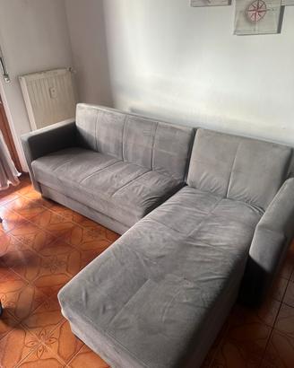 Divano con penisola contenitore
