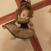 piccola bambola in porcellana 