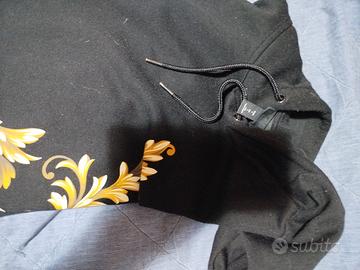 maglione nero fantasie oro