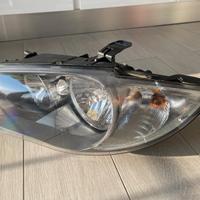 farò proiettore sx BMW e87