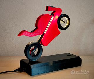 Moto Luce - lampada ad ad inclinazione