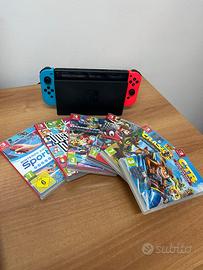 Console Nintendo Switch con scatola e giochi