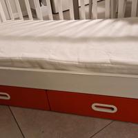 Lettino con sbarre e materasso