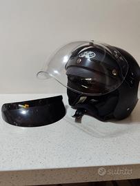 Casco jet vintage con visiera a bolla .