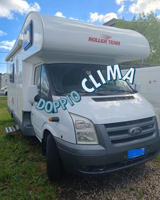 Camper mansardato con letti a castello 