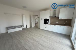 Bilocale con giardinetto e garage