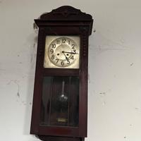 Orologio a pendolo da parete