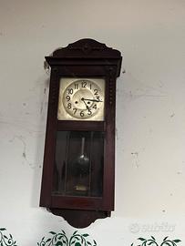 Orologio a pendolo da parete