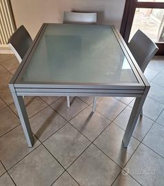 tavolo allungabile in vetro con sedie