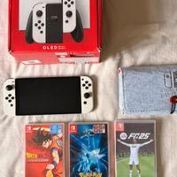 Nintendo switch oled + giochi + custodia