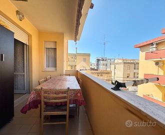 Trilocale con terrazza, viale Sardegna
