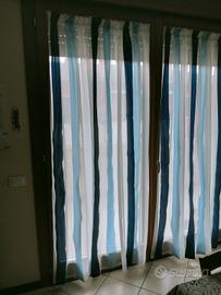 Tende a coppia per porta finestra Via Roma 60