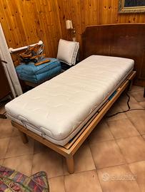 Letto singolo motorizzato + materasso Pirelli