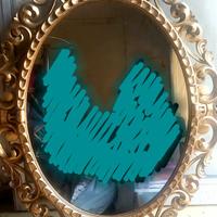 Specchio ovale in legno intagliato foglia d'oro