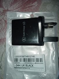 caricabatterie per presa inglese  con adattatore 