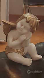 Puttino in ceramica antica 