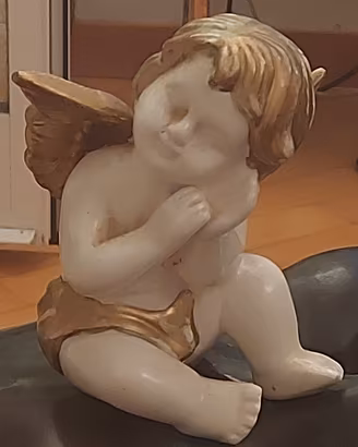 Puttino in ceramica antica 