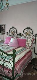 Letto in ferro battuto antico