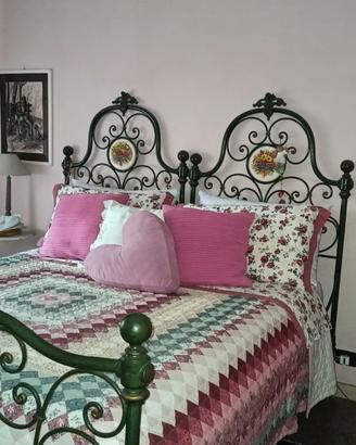 Letto in ferro battuto antico