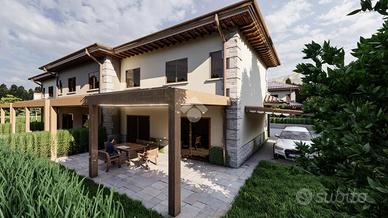 PORZIONE DI TRIFAMILIARE A SPELLO