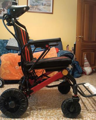 carrozzina elettrica
comando per
accompagnatore